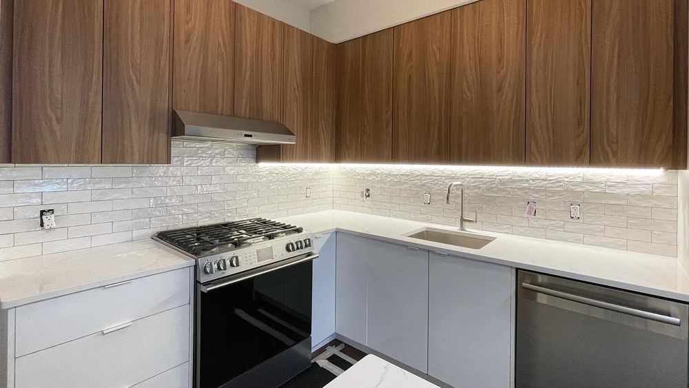 Renovated walnut kitchen in a Jersey City apartment